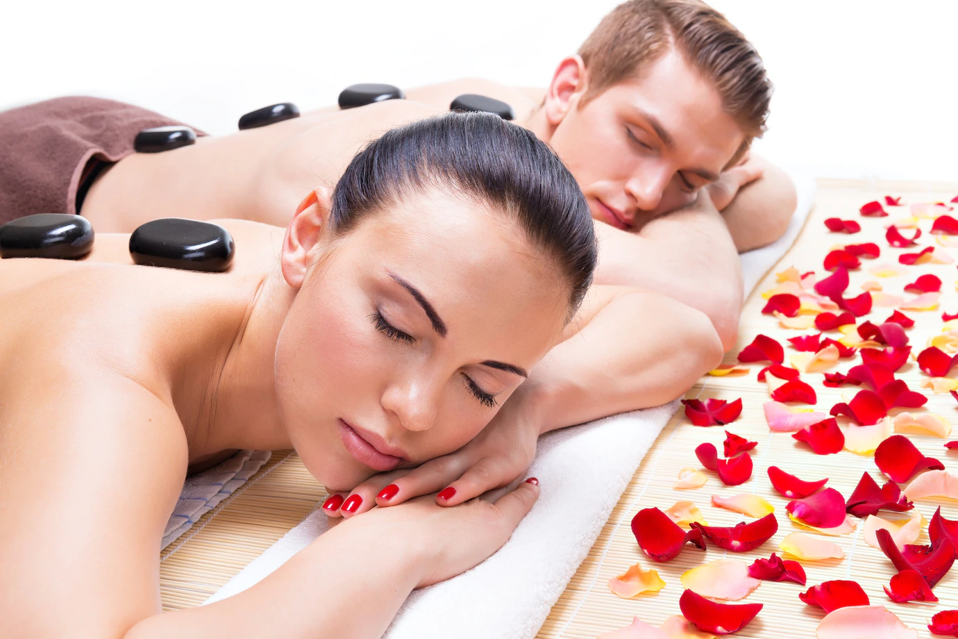 portrait-attractive-couple-relaxing-spa-salon-with-hot-stones-body_186202-7513